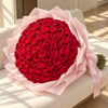 100 fresh roses hand-tied bouquet with pink wrapping paper — lifestyle photo