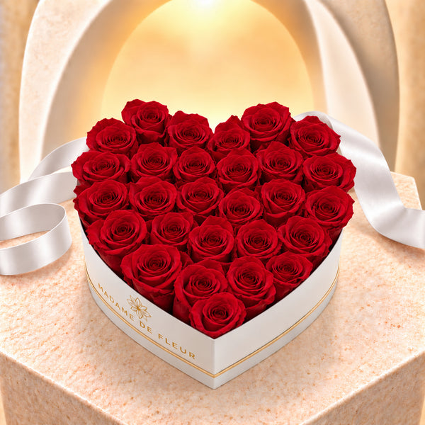 Large white heart box with red preserved roses, natural petals and white ribbon — approved main view
