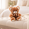 Small brown teddy bear on an ivory bedroom bench