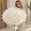Madame de Fleur 100 Fresh Roses Hand-Tied Bouquet — model photo