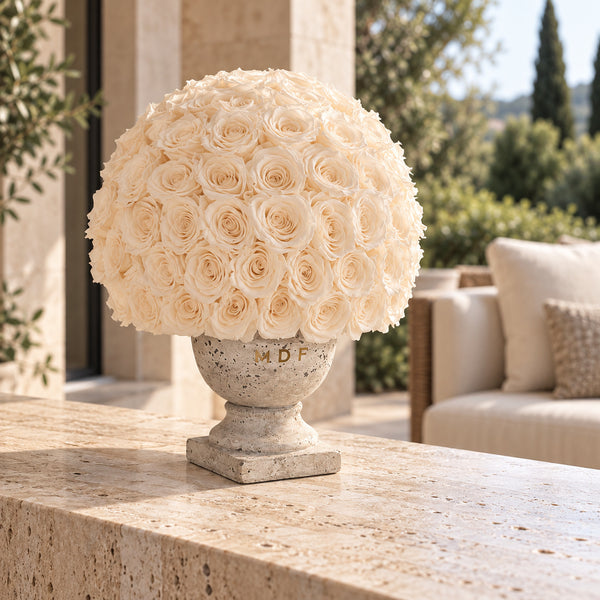 Doric Dome Vase with ivory preserved roses on a luxury patio