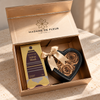 Gold & Essence Gift Box with roses and Velvet Musk perfume oil in a lifestyle setting.