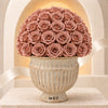 Sandora cream fluted urn with Mocha Nude preserved roses